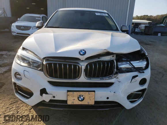 2016 BMW X6 xDrive35i with VIN 5UXKU2C57G0N81828, listed as a Copart auction lot 71186212 with 134,114 mi miles. Bid and sale history available at carsss.com. Image 5.