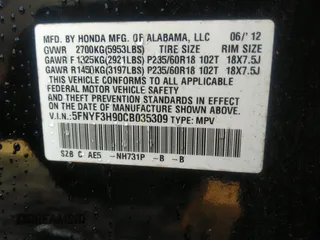 2012 Honda Pilot Touring with VIN 5FNYF3H90CB035309, listed as a IAAI auction lot 41063215 with 228,081 mi miles and . Bid and sale history available at carsss.com. Image 9.