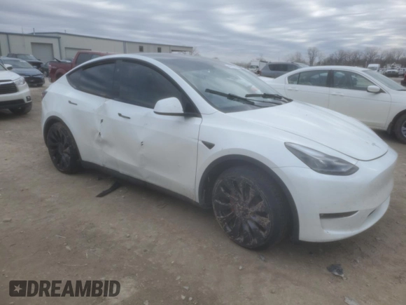 2023 Tesla Model Y Performance with VIN 7SAYGDEF0PF791552, listed as a Copart auction lot 44592545 with 29,075 mi miles and Salvage Title. Bid and sale history available at DreamBid. Image 4.