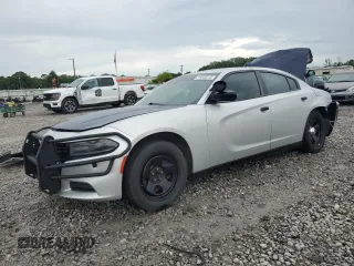 2019 Dodge Charger Police with VIN 2C3CDXATXKH627424, listed as a Copart auction lot 61445815 with 122,296 mi miles and Salvage title. Bid and sale history available at DreamBid. Image 1.