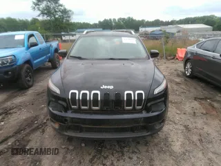 2014 Jeep Cherokee Latitude with VIN 1C4PJLCB1EW231178, listed as a IAAI auction lot 42128894 with 121,412 mi miles. Bid and sale history available at carsss.com. Image 12.