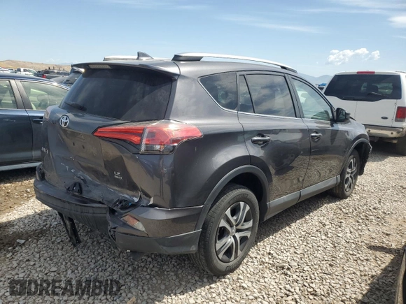 2017 Toyota RAV4 LE with VIN 2T3BFREV4HW592199, listed as a Copart auction lot 58538915 with 137,964 mi miles and Salvage title. Bid and sale history available at DreamBid. Image 3.