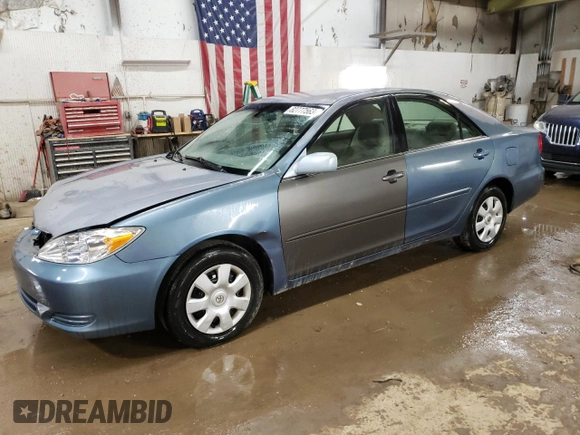 2004 Toyota Camry LE with VIN 4T1BE32K64U812388, listed as a Copart auction lot 82777563 with 209,219 mi miles and Clean Title. Bid and sale history available at carsss.com. Image 1.