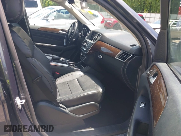 2015 Mercedes-Benz M 350 with VIN 4JGDA5JB7FA574881, listed as a IAAI auction lot 42246279 with 160,196 mi miles and . Bid and sale history available at DreamBid. Image 5.