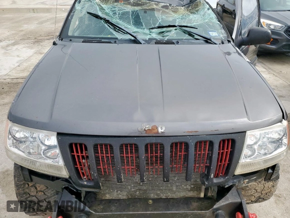 2003 Jeep Grand Cherokee Laredo with VIN 1J4GX48S63C604527, listed as a Copart auction lot 55996725 with Not provided miles and Non repairable. Bid and sale history available at DreamBid. Image 12.