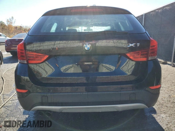 2015 BMW X1 xDrive28i with VIN WBAVL1C5XFVY31850, listed as a Copart auction lot 77491614 with 112,442 mi miles and Clean Title. Bid and sale history available at carsss.com. Image 6.