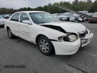 2000 Mazda 626 LX with VIN 1YVGF22CXY5112958, listed as a Copart auction lot 72740904 with 111,581 mi miles and Clean Title. Bid and sale history available at carsss.com. Image 4.