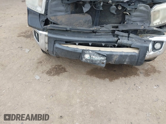 2014 Toyota Tundra SR5 z VIN 5TFEM5F18EX068522, wystawiony jako IAAI lot #41330508 z przebiegiem Nie podano mil oraz . Historia ofert i sprzedaży dostępna na DreamBid. Obrazek 11.
