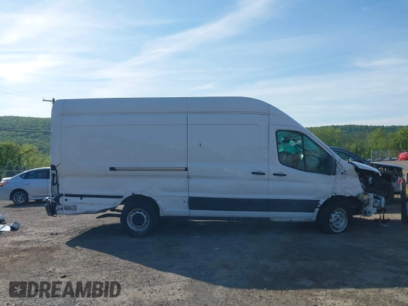 2021 Ford Transit Cargo z VIN 1FTBW3X84MKA60720, wystawiony jako IAAI lot #42202665 z przebiegiem 67 295 mil mil oraz . Historia ofert i sprzedaży dostępna na DreamBid. Obrazek 14.