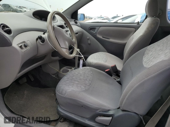 2000 Toyota ECHO with VIN JTDAT1230Y0074894, listed as a Copart auction lot 82236714 with 179,043 mi miles and Salvage Title. Bid and sale history available at DreamBid. Image 7.