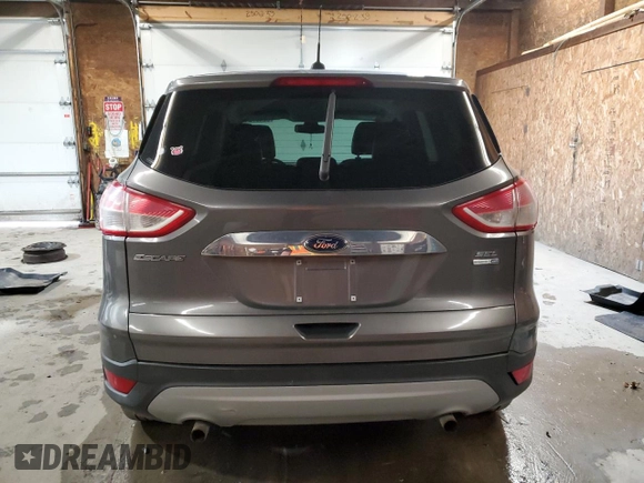 2013 Ford Escape SEL with VIN 1FMCU9HX5DUB97779, listed as a Copart auction lot 52407545 with 145,302 mi miles and Salvage Title. Bid and sale history available at carsss.com. Image 6.