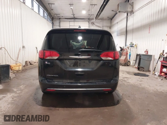2020 Chrysler Pacifica Touring L with VIN 2C4RC1BG9LR140072, listed as a IAAI auction lot 42199118 with 93,557 mi miles and . Bid and sale history available at DreamBid. Image 17.