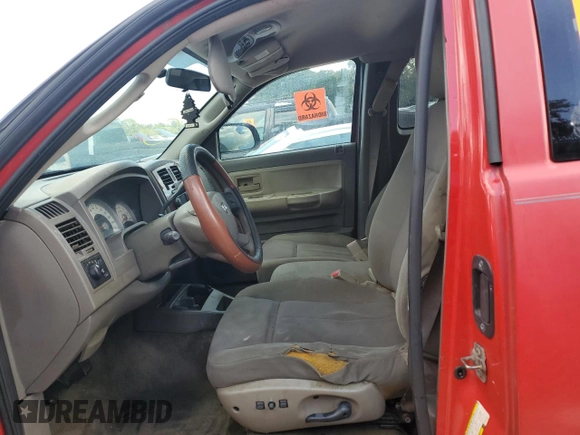 2006 Dodge Dakota SLT z VIN 1D7HE42N76S510319, wystawiony jako Copart lot #75268694 z przebiegiem Nie podano mil oraz Nie do naprawy • Non repairable. Historia ofert i sprzedaży dostępna na DreamBid. Obrazek 7.