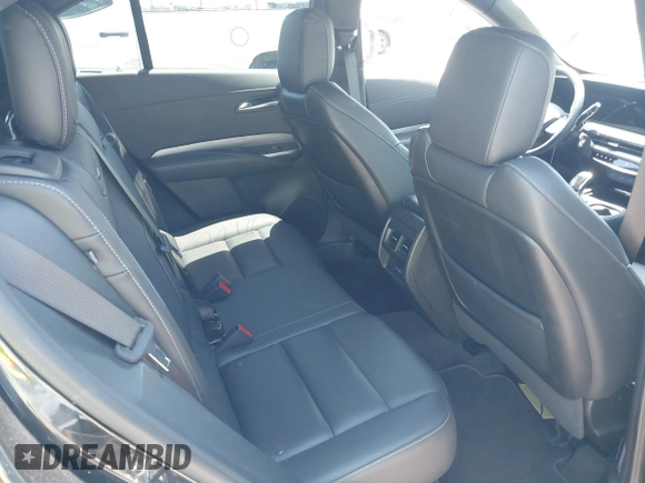 2024 Cadillac XT4 AWD Premium Luxury z VIN 1GYFZDR44RF144801, wystawiony jako IAAI lot #42646613 z przebiegiem 37 358 mil mil oraz . Historia ofert i sprzedaży dostępna na DreamBid. Obrazek 8.