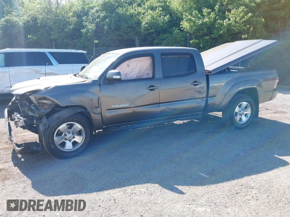 2015 Toyota Tacoma with VIN 3TMMU4FN5FM082376, listed as a IAAI auction lot 42144113 with 98,244 mi miles and . Bid and sale history available at DreamBid. Image 2.