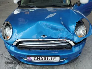 2011 MINI Hardtop with VIN WMWSU3C52BT252207, listed as a Copart auction lot 62735905 with 121,121 mi miles and Salvage title. Bid and sale history available at DreamBid. Image 11.