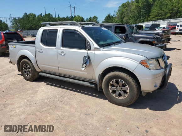 2014 Nissan Frontier SV z VIN 1N6AD0EV9EN738982, wystawiony jako Copart lot #61353985 z przebiegiem 205 593 mil mil oraz Szkoda całkowita • Salvage title. Historia ofert i sprzedaży dostępna na DreamBid. Obrazek 4.