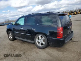 2012 Chevrolet Tahoe LTZ with VIN 1GNSKCE08CR322969, listed as a Copart auction lot 50604555 with 165,190 mi miles and Salvage title. Bid and sale history available at DreamBid. Image 2.