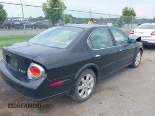 2002 Nissan Maxima GXE with VIN JN1DA31D52T429057, listed as a IAAI auction lot 42771435 with 122,398 mi miles and . Bid and sale history available at DreamBid. Image 4.