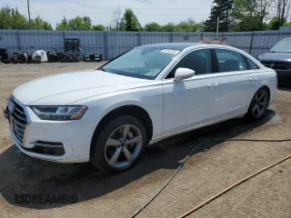 2019 Audi A8 with VIN WAU8DAF89KN010684, listed as a Copart auction lot 61764105 with Not provided miles and Salvage title. Bid and sale history available at DreamBid. Image 1.