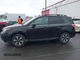 2018 Subaru Forester Premium with VIN JF2SJGEC4JH581718, listed as a IAAI auction lot 41988454 with 76,376 mi miles. Bid and sale history available at carsss.com. Image 14.