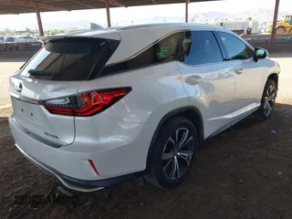 2018 Lexus RX with VIN JTJGZKCA3J2004499, listed as a IAAI auction lot 42019698 with 53,674 mi miles. Bid and sale history available at carsss.com. Image 4.
