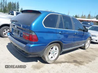 2001 BMW X5 4.4i with VIN WBAFB33521LH13219, listed as a IAAI auction lot 42029117 with 163,058 mi miles. Bid and sale history available at carsss.com. Image 4.