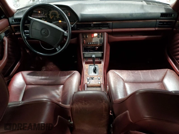 1990 Mercedes-Benz 560 with VIN WDBCA39E7LA517710, listed as a Copart auction lot 85307074 with 225,233 mi miles and Salvage Title. Bid and sale history available at DreamBid. Image 8.