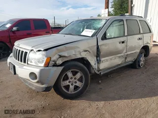 2007 Jeep Grand Cherokee Laredo with VIN 1J8GS48K77C515424, listed as a IAAI auction lot 41072236 with 263,248 mi miles. Bid and sale history available at carsss.com. Image 2.