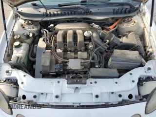 1999 Ford Taurus SE z VIN 1FAFP58S0XA272714, wystawiony jako Copart lot #48966215 z przebiegiem 255 885 mil mil oraz Szkoda całkowita • Salvage title. Historia ofert i sprzedaży dostępna na DreamBid. Obrazek 12.