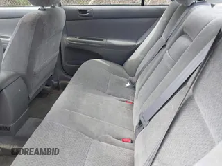 2002 Toyota Camry LE z VIN 4T1BE32K42U029129, wystawiony jako IAAI lot #42190162 z przebiegiem 191 423 mil mil oraz . Historia ofert i sprzedaży dostępna na DreamBid. Obrazek 8.
