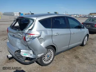 2013 Ford C-Max Energi SEL with VIN 1FADP5CU1DL521392, listed as a IAAI auction lot 41976775 with 121,715 mi miles. Bid and sale history available at carsss.com. Image 4.