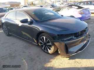 2023 Lucid Air Touring with VIN 50EA1TEA1PA002151, listed as a IAAI auction lot 41219565 with 8,215 mi miles. Bid and sale history available at carsss.com. Image 1.