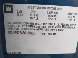 2003 Pontiac Grand Am SE1 with VIN 1G2NF52E43C158438, listed as a IAAI auction lot 41495880 with 47,381 mi miles. Bid and sale history available at carsss.com. Image 9.