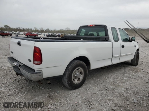 1999 Ford F-150 with VIN 2FTRX17W3XCA68816, listed as a Copart auction lot 53080755 with 201,501 mi miles and Salvage Title. Bid and sale history available at DreamBid. Image 3.
