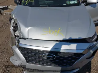2019 Hyundai Santa Fe SE with VIN 5NMS23AD3KH102739, listed as a IAAI auction lot 42097252 with 116,023 mi miles and . Bid and sale history available at DreamBid. Image 10.