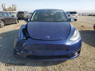 2024 Tesla Model Y Long Range с VIN 7SAYGDEEXRA223963, выставлен на аукционе Copart как лот 58442255 с пробегом 36 731 миль миль и Списание • Salvage title. История ставок и продаж доступна на DreamBid. Изображение 5.