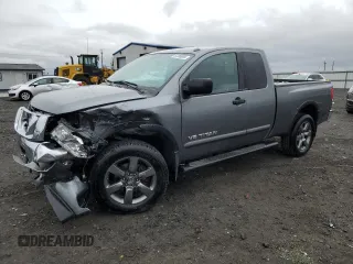 2015 Nissan Titan Pro-4X with VIN 1N6AA0CC6FN512488, listed as a Copart auction lot 57286085 with 64,834 mi miles and Salvage title. Bid and sale history available at DreamBid. Image 1.