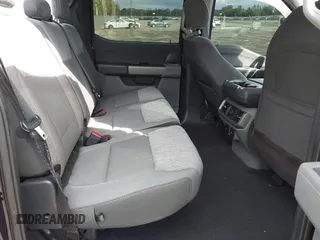 2021 Ford F-150 XL z VIN 1FTEW1CP7MKD20266, wystawiony jako IAAI lot #41618910 z przebiegiem 80 194 mil mil oraz . Historia ofert i sprzedaży dostępna na DreamBid. Obrazek 8.