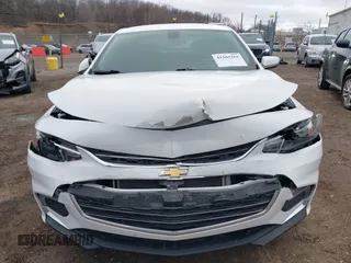 2018 Chevrolet Malibu LT z VIN 1G1ZD5ST4JF284966, wystawiony jako IAAI lot #41503355 z przebiegiem 99 181 mil mil oraz . Historia ofert i sprzedaży dostępna na DreamBid. Obrazek 12.