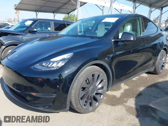 2021 Tesla Model Y Performance with VIN 5YJYGDEF1MF092889, listed as a IAAI auction lot 42076715 with 48,373 mi miles and . Bid and sale history available at DreamBid. Image 20.