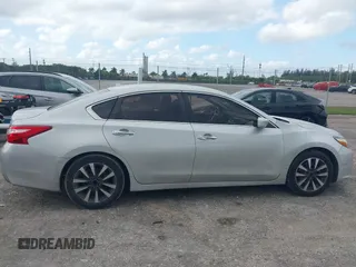 2017 Nissan Altima SV with VIN 1N4AL3AP7HC188945, listed as a IAAI auction lot 42111225 with 157,185 mi miles and . Bid and sale history available at carsss.com. Image 13.
