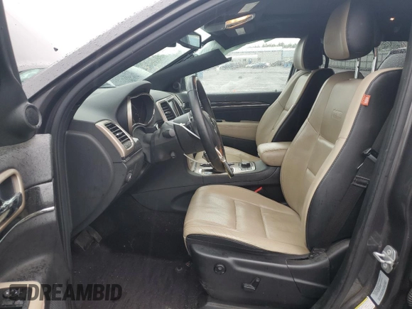 2016 Jeep Grand Cherokee Limited 75th Anniversary with VIN 1C4RJFBGXGC482082, listed as a Copart auction lot 56217165 with 80,787 mi miles and Salvage Title. Bid and sale history available at DreamBid. Image 7.
