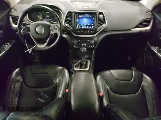 2014 Jeep Cherokee Limited with VIN 1C4PJLDS9EW241374, listed as a Copart auction lot 61048025 with 77,697 mi miles and Salvage title. Bid and sale history available at DreamBid. Image 8.
