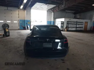2023 Tesla Model 3 with VIN 5YJ3E1EA5PF396413, listed as a IAAI auction lot 42188639 with 57,717 mi miles and . Bid and sale history available at DreamBid. Image 16.