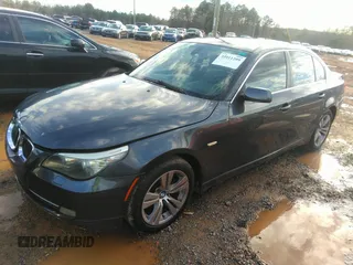 2009 BMW 5 Series 528i with VIN WBANU53529C121796, listed as a IAAI auction lot 35911209 with 178,049 mi miles and . Bid and sale history available at carsss.com. Image 2.