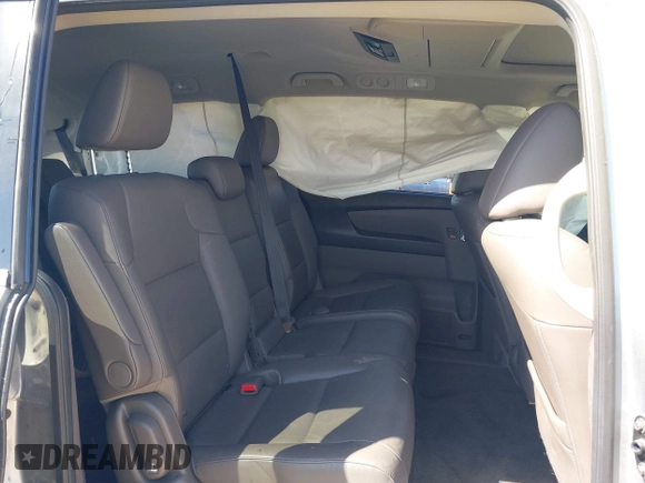 2016 Honda Odyssey Touring Elite with VIN 5FNRL5H96GB090653, listed as a IAAI auction lot 41720195 with 68,969 mi miles. Bid and sale history available at carsss.com. Image 8.