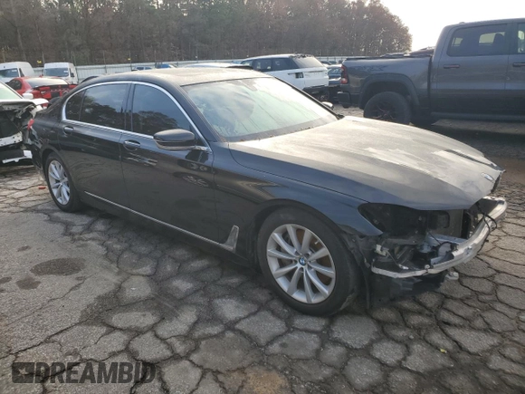 2018 BMW 7 Series 740i with VIN WBA7E2C58JG743269, listed as a Copart auction lot 84905044 with 74,951 mi miles and Salvage Title. Bid and sale history available at carsss.com. Image 4.