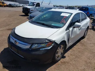 2012 Honda Civic Hybrid with VIN JHMFB4F24CS005990, listed as a IAAI auction lot 41978020 with 164,915 mi miles. Bid and sale history available at carsss.com. Image 6.