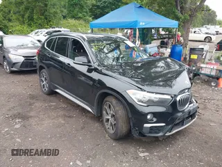 2018 BMW X1 xDrive28i with VIN WBXHT3C35J5L28412, listed as a IAAI auction lot 42403236 with 118,190 mi miles and . Bid and sale history available at DreamBid. Image 1.